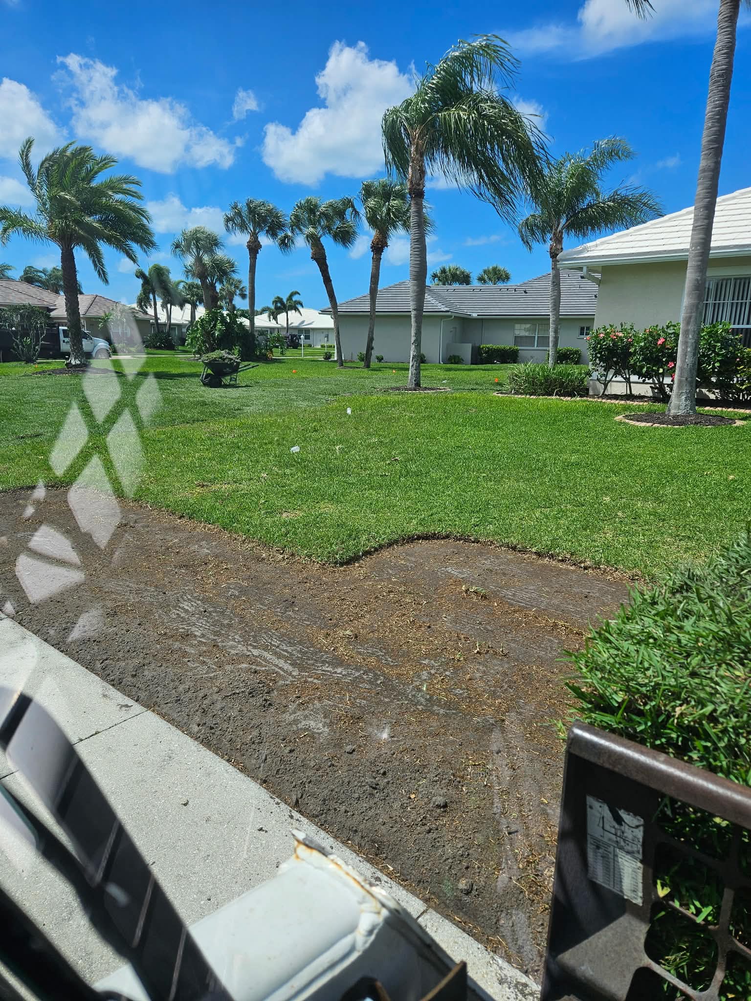 Street-side lawn installation in progress